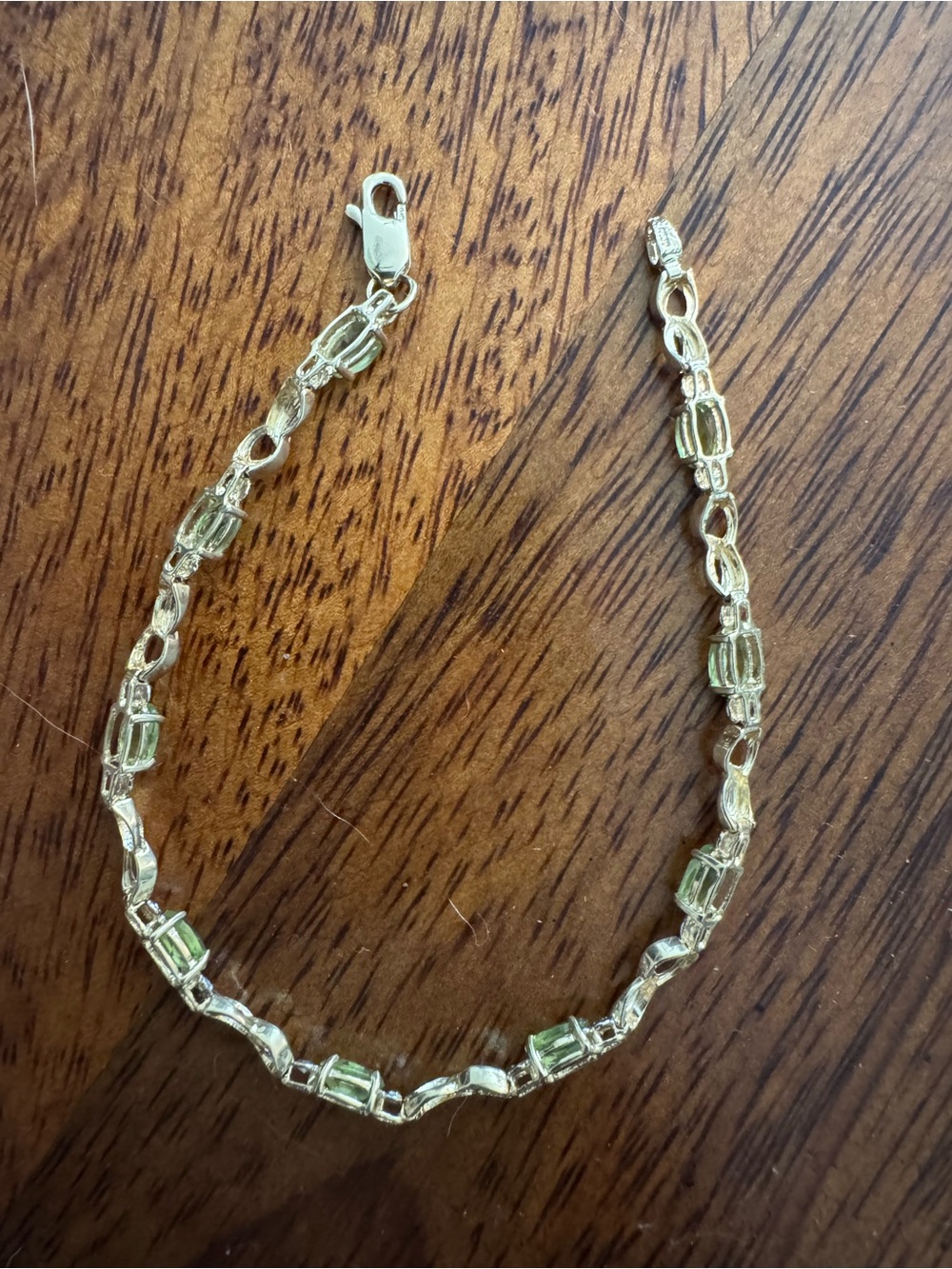 10k  gold diamond and peridot tennis bracelet